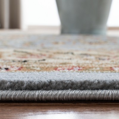 Lyndhurst Light Blue and Ivory Synthetic 10' x 14' Rectangular Area Rug