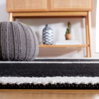 Handmade Black and Ivory Wool Flat Woven 8' x 10' Rug
