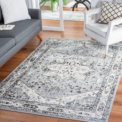 Elegant Heirloom 9' x 12' Grey and Black Synthetic Area Rug