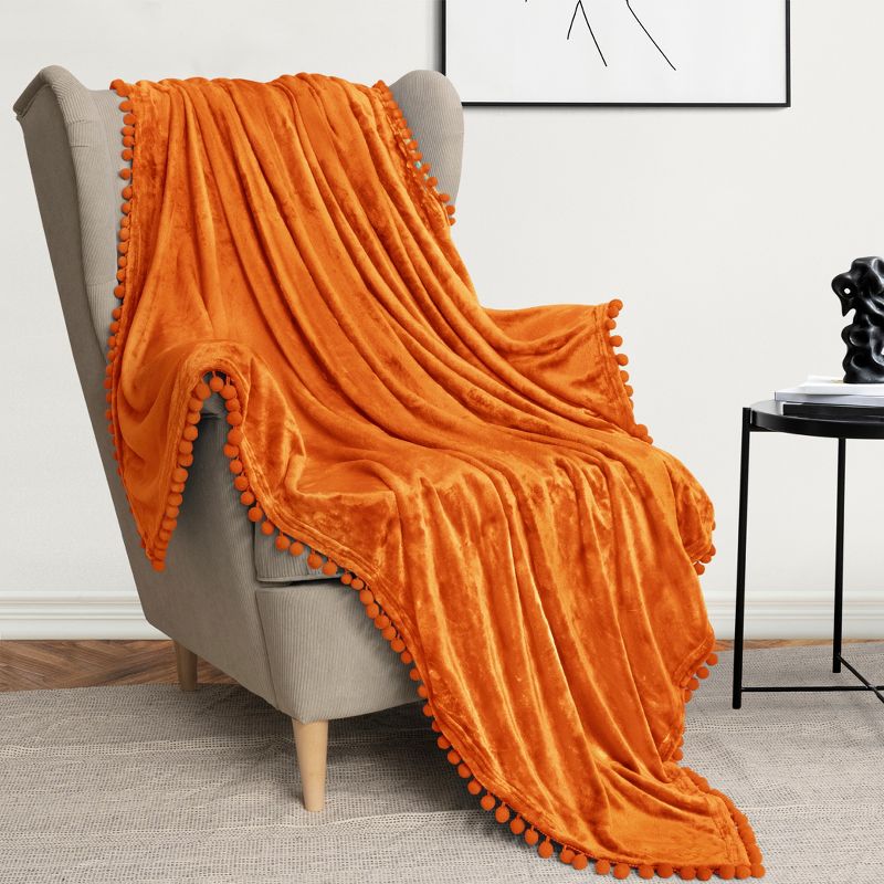 PAVILIA Fleece Pom Pom Blanket Throw for Sofa Bed, Soft Lightweight Pompom Fringe Blanket for Couch, 1 of 8