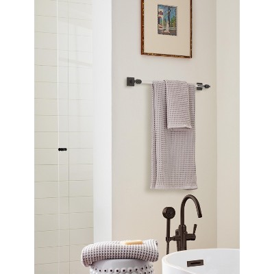 24 Inch Clear and Oil-Rubbed Bronze Wall Mounted Towel Bar