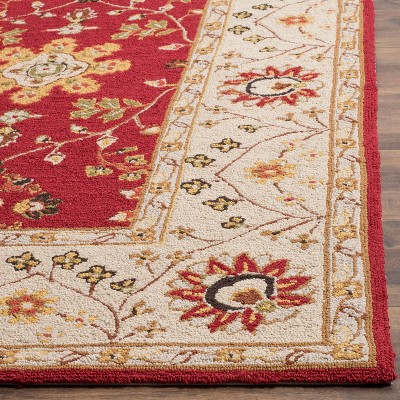Handmade Red and Ivory Synthetic 4' x 6' Rectangular Area Rug