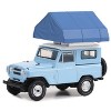 1969 Nissan Patrol (60) Light Blue with White Top and Camp'otel Cartop Sleeper Tent 1/64 Diecast Model Car by Greenlight - 2 of 3