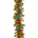 National Tree Company Pre-Lit Artificial Christmas Garland, Green, Evergreen, With Berry Clusters, Ribbon, Ball Ornaments, Plug In,9 Feet