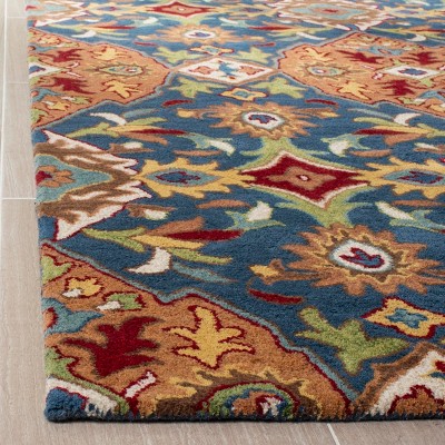Handmade Blue and Camel Wool Tufted 6' x 9' Area Rug