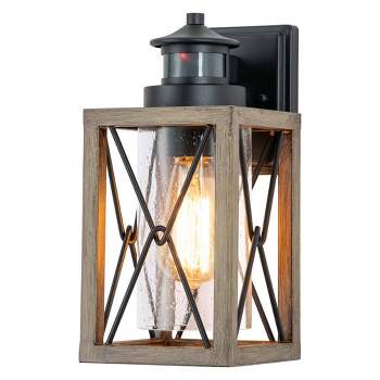C Cattleya 1-Light Black and Faux Wood Motion Sensing Dusk to Dawn Outdoor Wall Light with Clear Seeded Glass