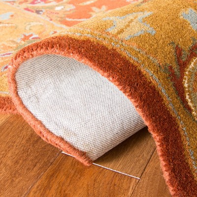 Elegant Heritage Red & Natural Wool 6' x 9' Area Rug