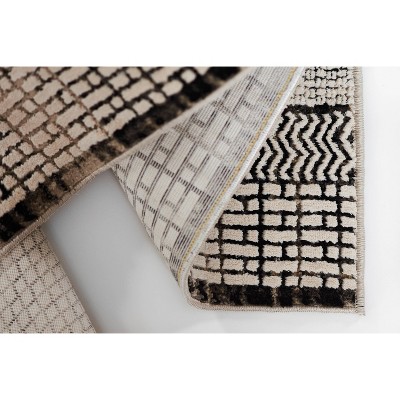 Geometric Black and Ivory Rectangular Synthetic Area Rug