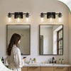 DORESshop 3-Light Vanity Wall Sconce, Black Finish, Transparent Tube Glass Shades, Square Plate with Rods, E26 Bulb Compatible - 4 of 4