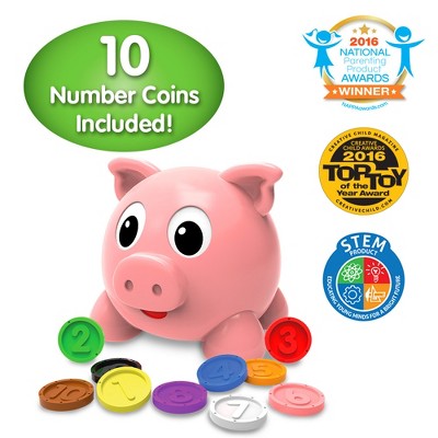 Interactive Pink Piggy Bank with Colorful Number Coins