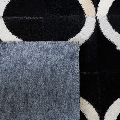 Hand-Knotted Black and Beige Geometric Cowhide Rug