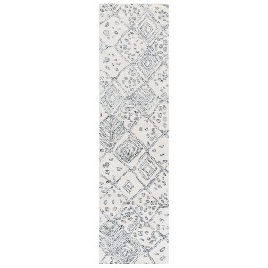 Ebony EBN929 Hand Tufted Indoor Rugs - Safavieh - 1 of 4