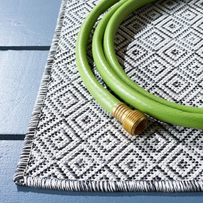 Ivory and Black Rectangular Geometric Indoor/Outdoor Rug