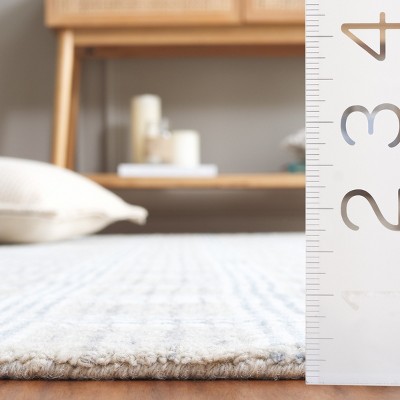 Ivory Hand-Tufted Wool 4' x 6' Rectangular Rug