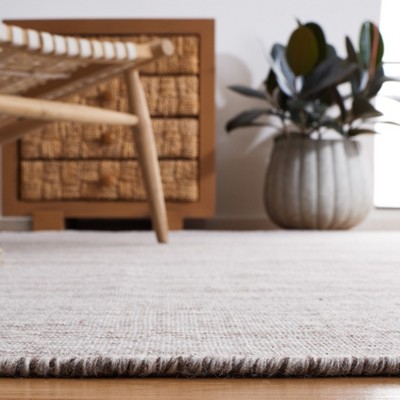 Beige and Ivory 8' x 10' Flatweave Wool Area Rug