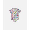 Deux par Deux Girl Printed Short Sleeve One-Piece Swimsuit with Frills White, Pink, and Green Flowers - 3 of 4