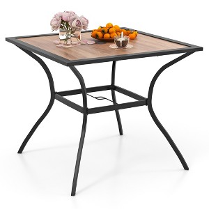 Tangkula Patio Table for 4 People w/ Umbrella Hole Wood-Like Tabletop Metal Support Legs - 1 of 4
