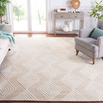 Beige and Ivory Floral Tufted Wool 8' x 10' Area Rug