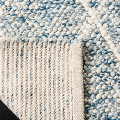 Ivory and Blue Hand-Tufted Wool Area Rug, 6' x 9'