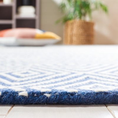 Handmade Light Blue and Ivory Wool Area Rug 4' x 6'