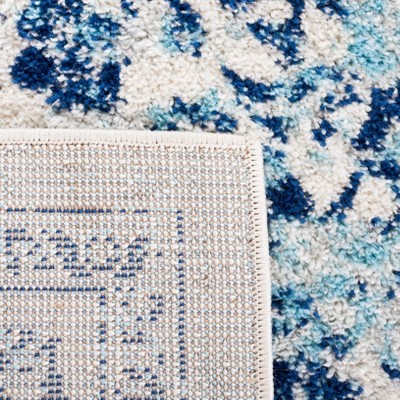 Ivory and Blue 8' x 10' Synthetic Square Area Rug