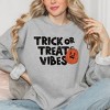 Simply Sage Market Women's Graphic Sweatshirt Trick Or Treat Vibes Pumpkin - 2 of 4