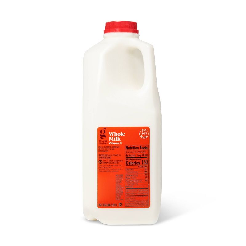 White plastic jug of whole milk with a red cap and an orange label displaying nutrition facts and "Whole Milk Vitamin D" text.