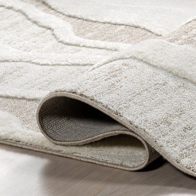 Ivory and Beige Abstract High-Low Tasseled 6'7" x 9' Area Rug