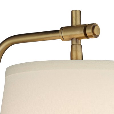 Gold Swing Arm Wall Sconce with Off-White Shade