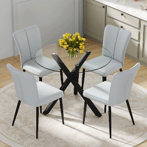 Lyngins Modern Round Glass Dining Table Set – Transparent Top with X-Shaped Black Metal Base & 4 PU Chairs with a Vertical Stripe Design - 1 of 4