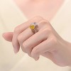 Guili Elegant Sterling Silver Rhodium Plated Bypass Ring with Clear and Yellow Cubic Zirconia for a Sparkling and Timeless Design, Size 6, 7, and 8. - 2 of 3