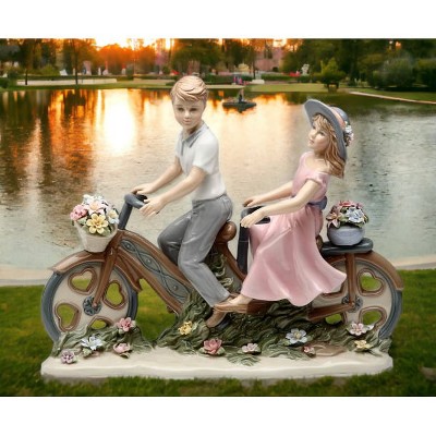 Charming Ceramic Couple on Bicycle Figurine with Floral Details