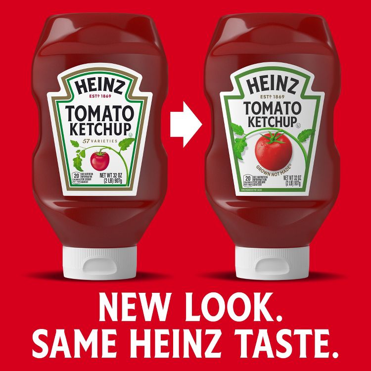 Two upside-down red colored Heinz Tomato Ketchup bottles with white caps showing old and new labels side-by-side with an arrow between, each labeled HEINZ Tomato Ketchup 32 oz.
