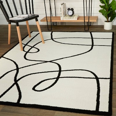Cajal White and Black Abstract Kids' Rectangular Area Rug 5' x 7'