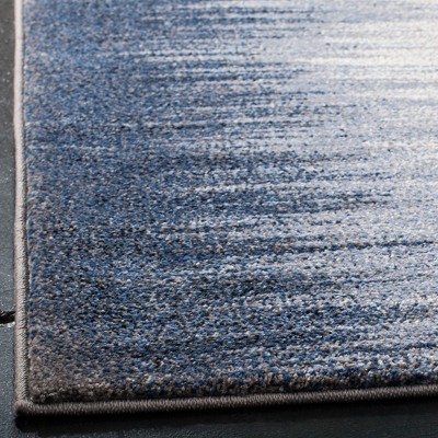 Blue and Navy Abstract 8' x 10' Stain-Resistant Area Rug