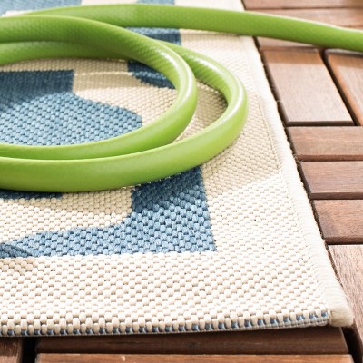 Blue and Beige Synthetic 79" Rectangular Indoor/Outdoor Rug