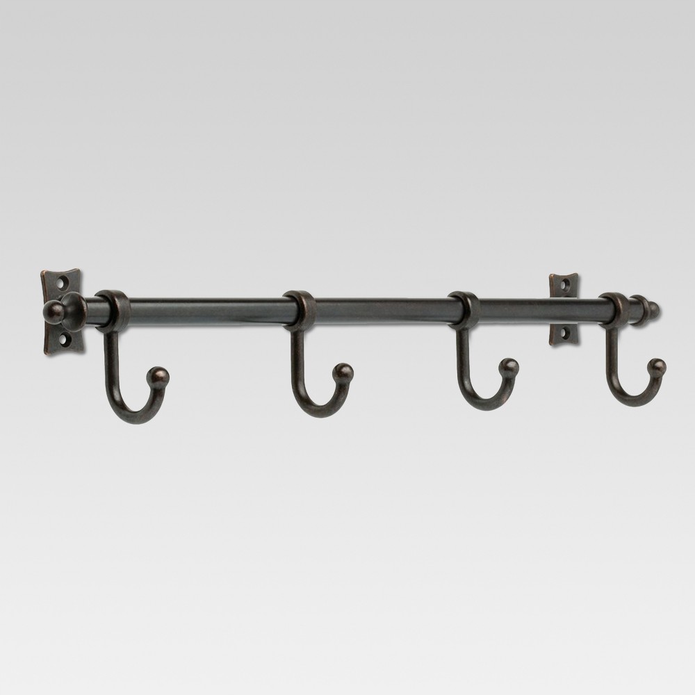 Essick Hook Rack - Oil Rubbed Bronze - Threshold In need of extra storage space throughout your home? The Threshold Essick Hook Rack can straighten up your space in style. This closet rack has 4 hooks made of zinc with a beautiful satin nickel finish. It's de9cor enhancing storage that neatens with style. Mounting screws are included. If you’re not satisfied with any Target Owned Brand item, return it within one year with a receipt for an exchange or a refund.