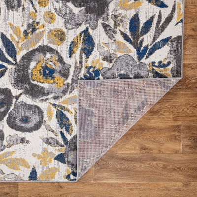 Ivory Floral Bliss 5' x 7' Easy-Care Synthetic Area Rug