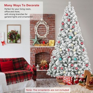 Artificial 4ft Flocked Christmas Tree with 233 PVC Branch Tips, Round head, Foldable Base for Indoor Holiday Decorating - 1 of 4