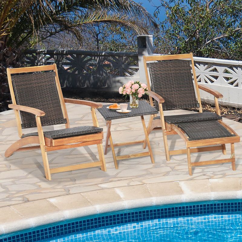 Costway 4PCS Patio Rattan Folding Lounge Chair Table Acacia Wood withRetractable Footrest, 1 of 10