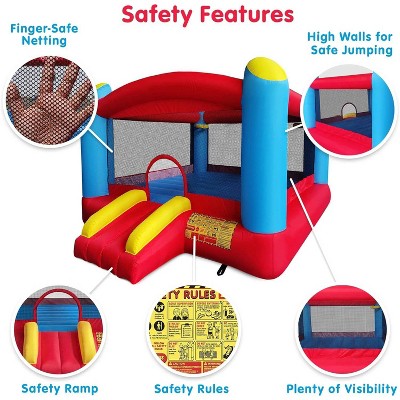 Enormous Red and Blue Inflatable Bounce House with Double Basketball Hoops