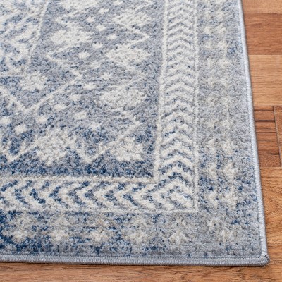 Ivory and Light Grey Synthetic Reversible Area Rug