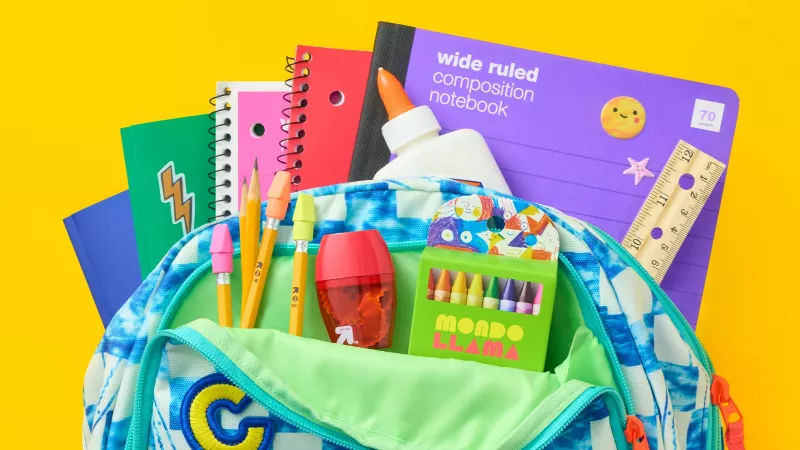 Stop-motion video of backpack filling up with school supplies.