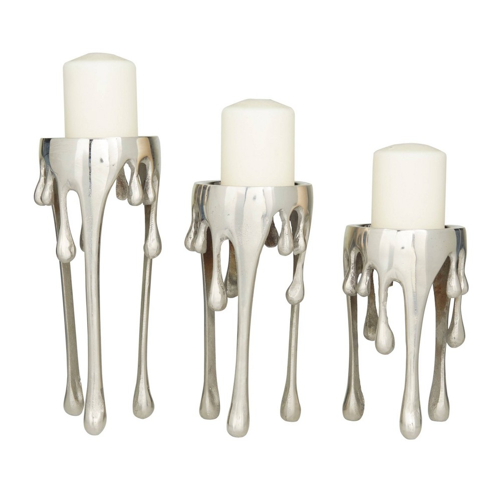 CosmoLiving by Cosmopolitan Set of 3 Metal Drip Candle Holder with Melting Designed Legs Silver Elegant Tabletop Decor