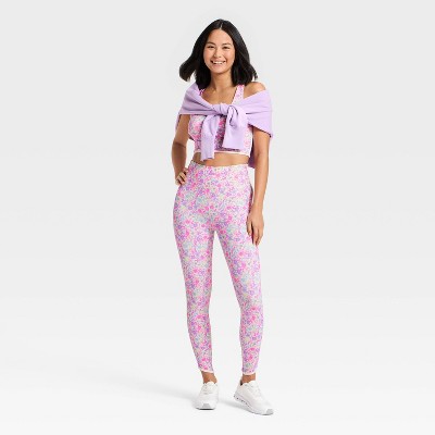 Floral patterned leggings in pink and purple colors.