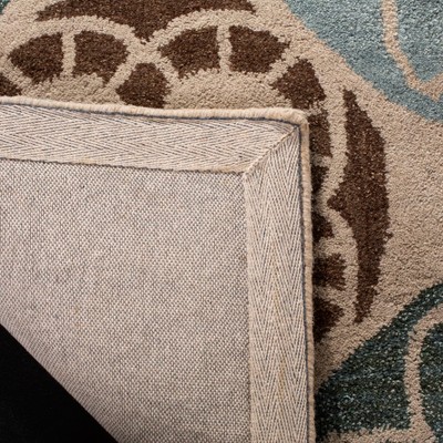 Beige and Blue 6' x 9' Hand-Tufted Wool Area Rug