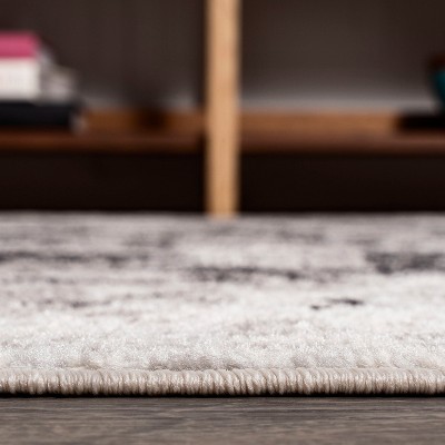 Ivory and Charcoal Abstract Synthetic Area Rug