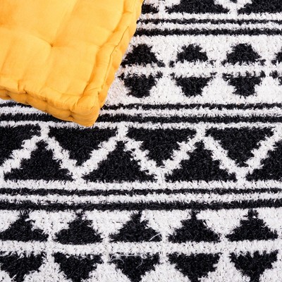 Augustine Black and Ivory Flat Woven Synthetic Area Rug