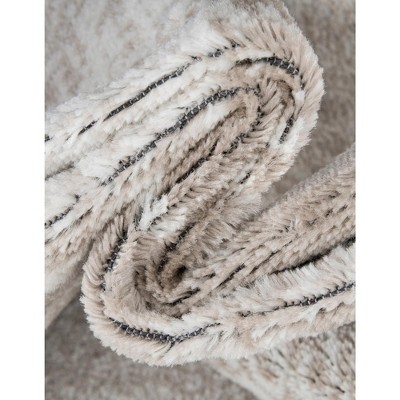 Beige and Brown Synthetic Low Pile Bohemian Area Rug