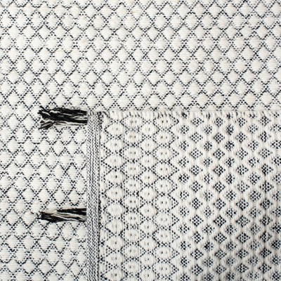 Handwoven Black and Ivory Cotton-Wool Blend Ikat Area Rug